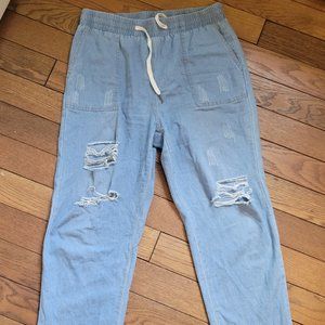 Distressed light wash jeans